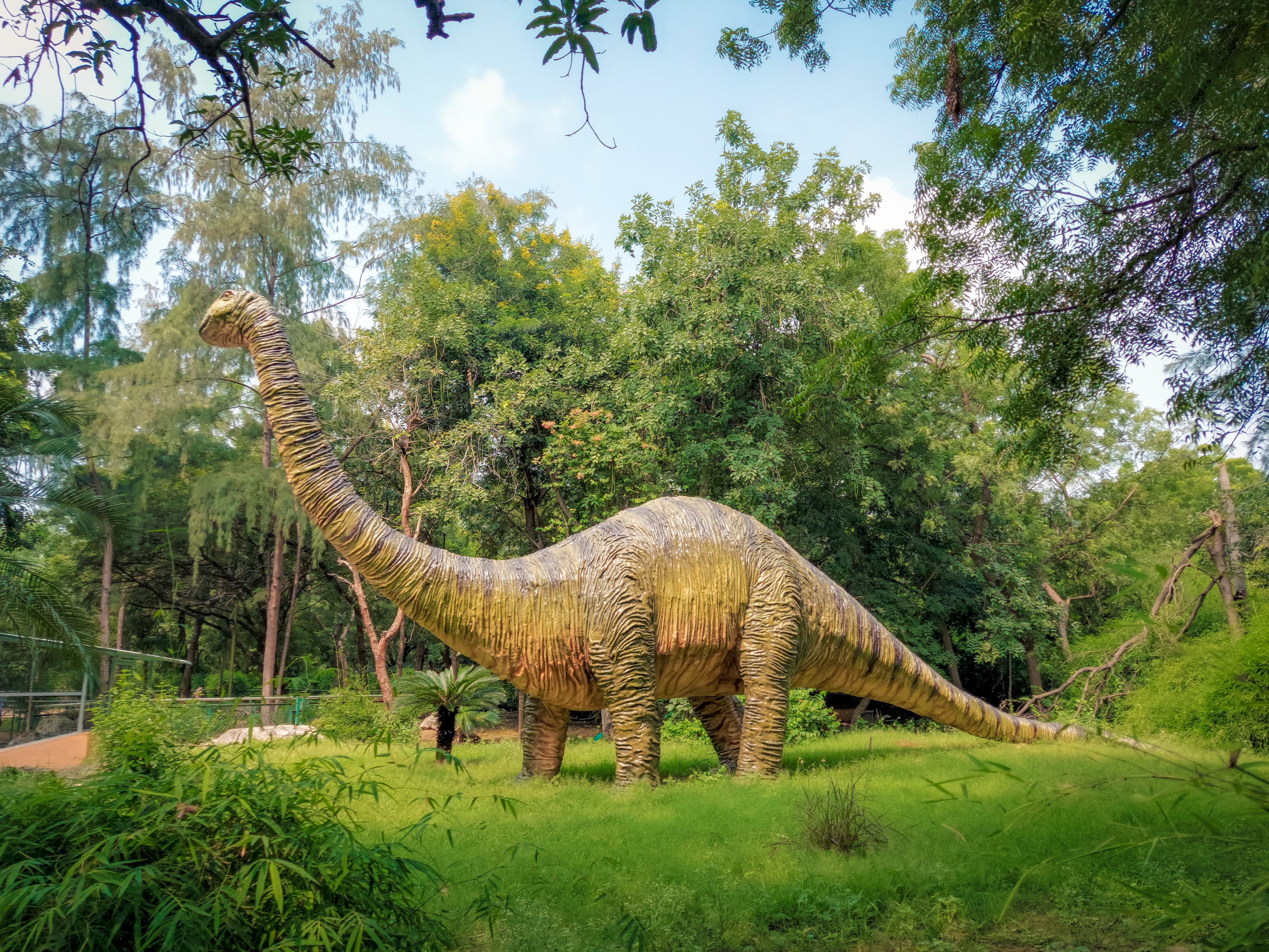 Illustration of dinosaurs alongside biblical landscapes